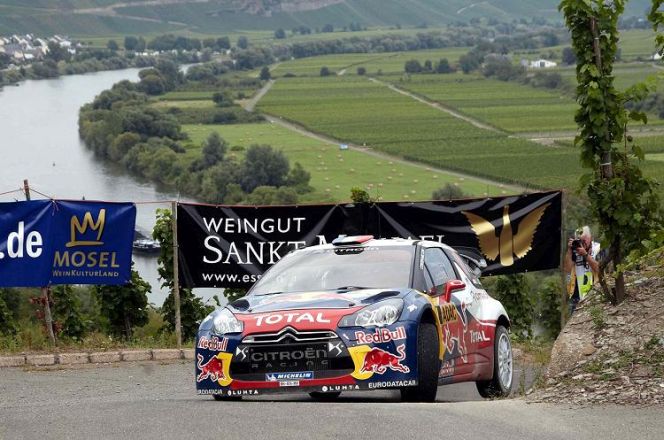 French rally driver Sebastien Loeb and co-driver Daniel Elena (MCO) in their Citroen DS3 WRC pass the fifth special stage of the ADAC Rallye Deutschland in the vineyards around the Mosel river near Kaesten, Germany, 24 August 2012 Organizers expect more than 200,000 people to the three-day event. Photo: THOMAS FREY  -ALLIANCE-INFOPHOTO